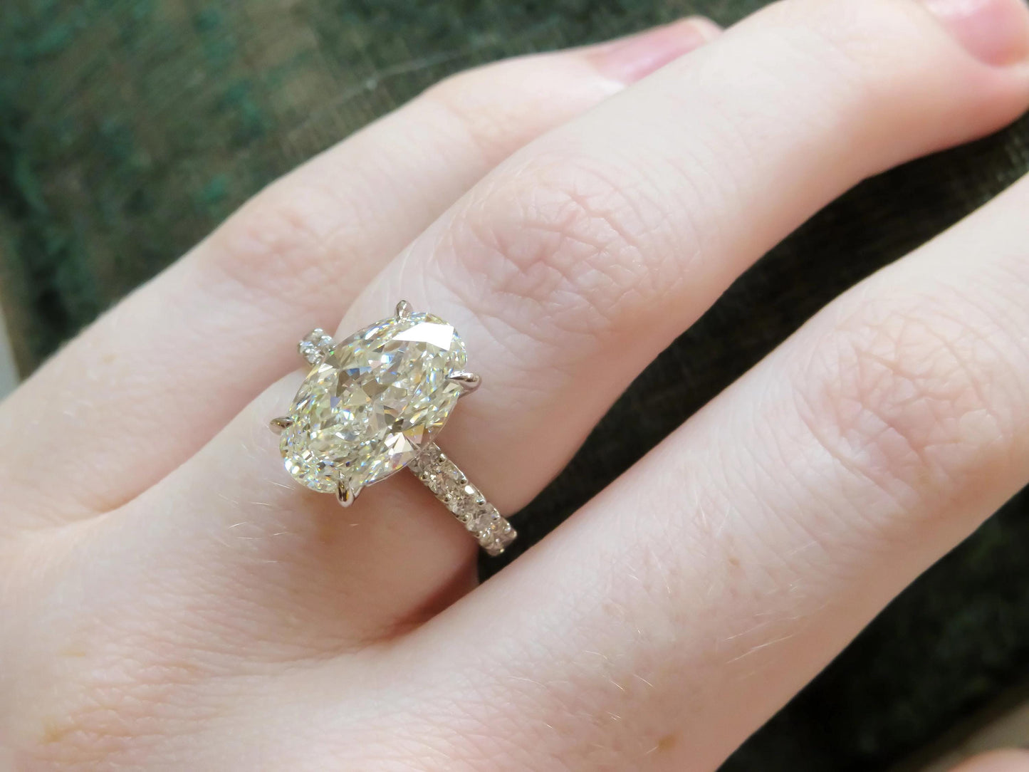 4.01 Carat GIA Certified Oval Diamond Ring in Platinum with Hidden Diamond Halo