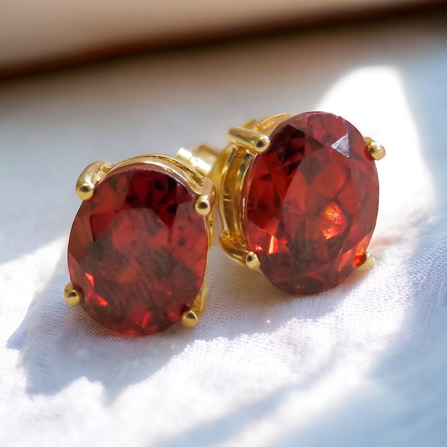 Garnet Oval Stud Earrings in 14K Yellow Gold