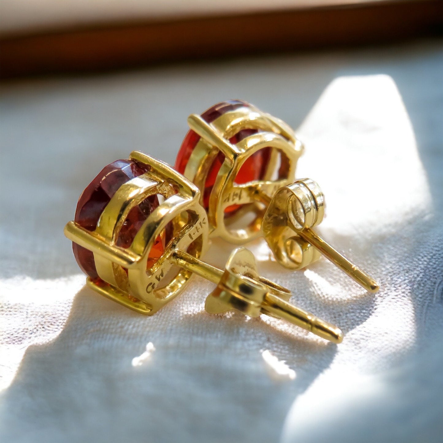 Garnet Oval Stud Earrings in 14K Yellow Gold