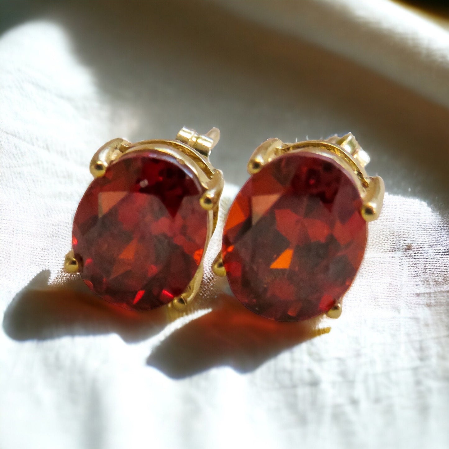 Garnet Oval Stud Earrings in 14K Yellow Gold