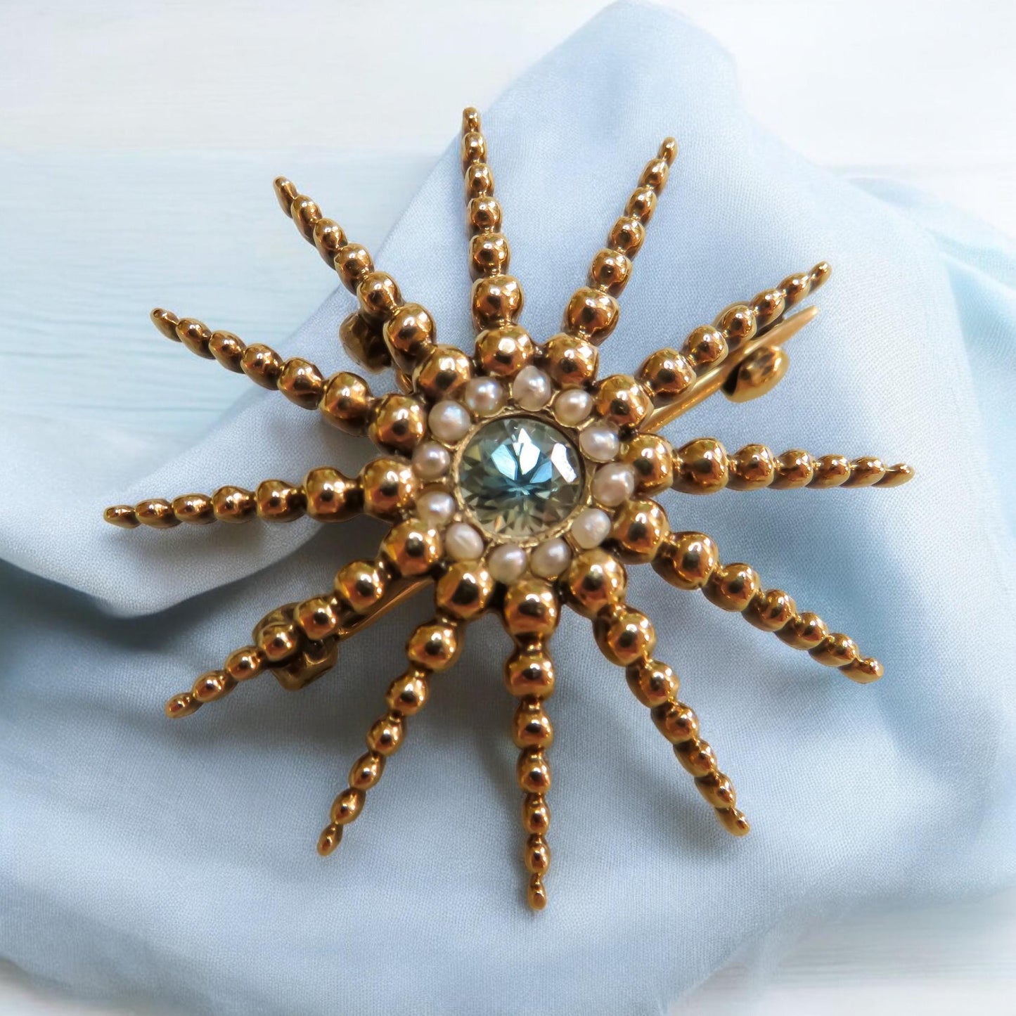 Antique Starburst Pendant/Brooch with Blue Zircon and Pearls