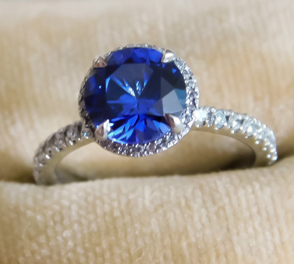 Estate Sapphire Ring with Diamond Halo in Platinum