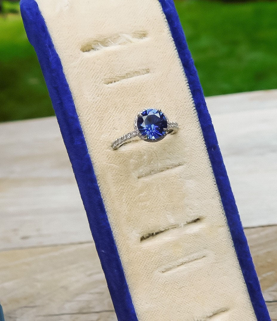 Estate Sapphire Ring with Diamond Halo in Platinum