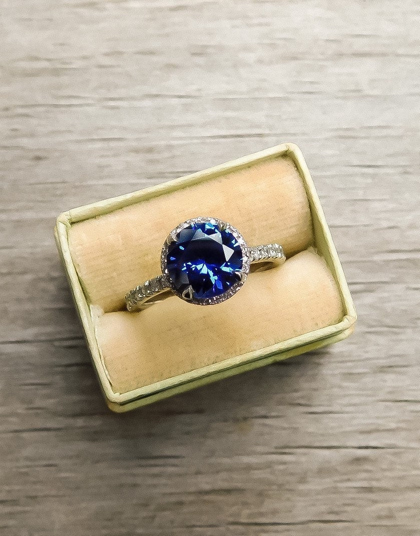 Estate Sapphire Ring with Diamond Halo in Platinum