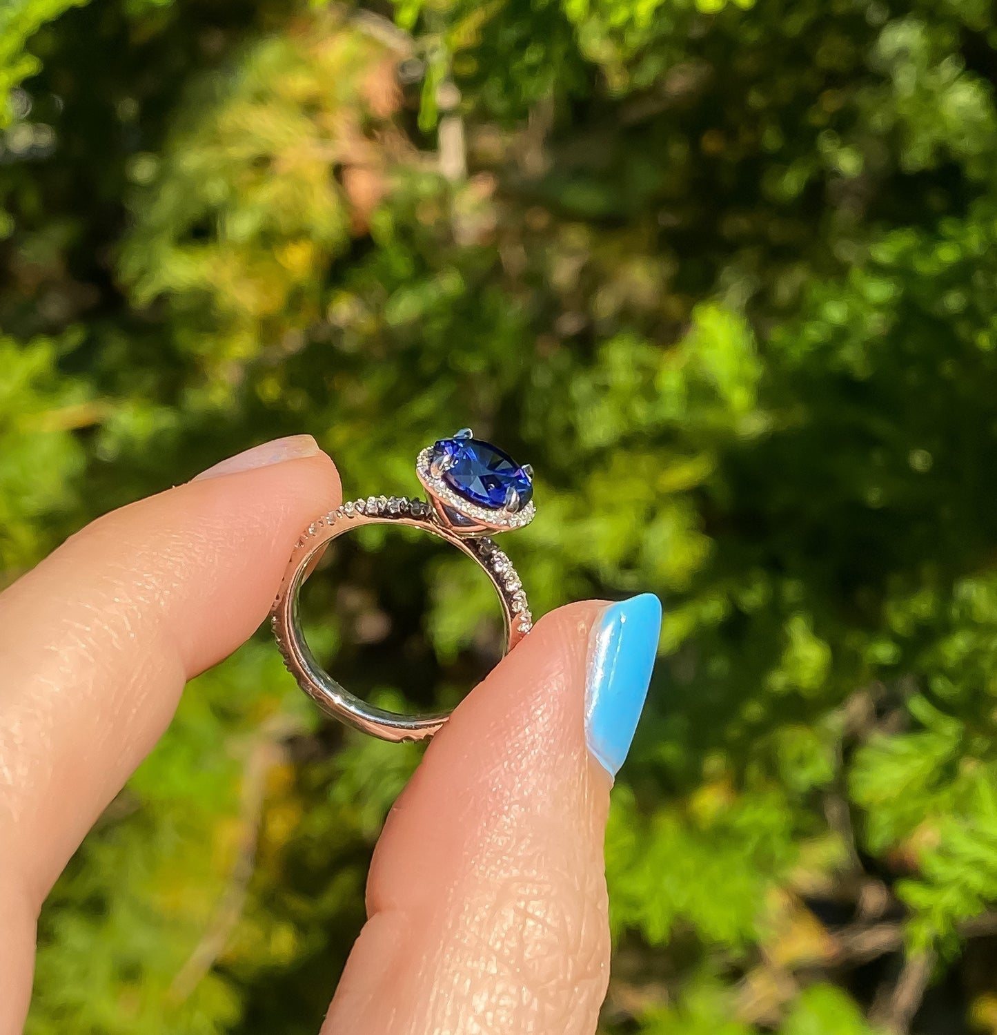 Estate Sapphire Ring with Diamond Halo in Platinum