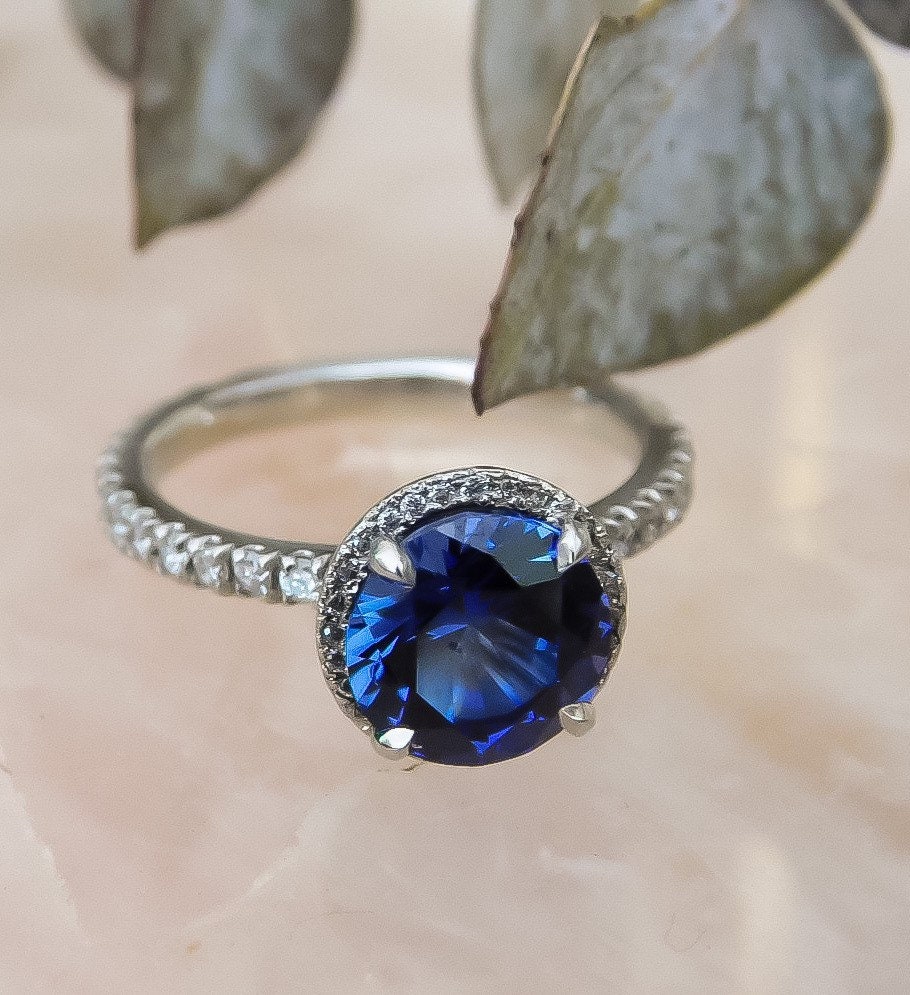 Estate Sapphire Ring with Diamond Halo in Platinum