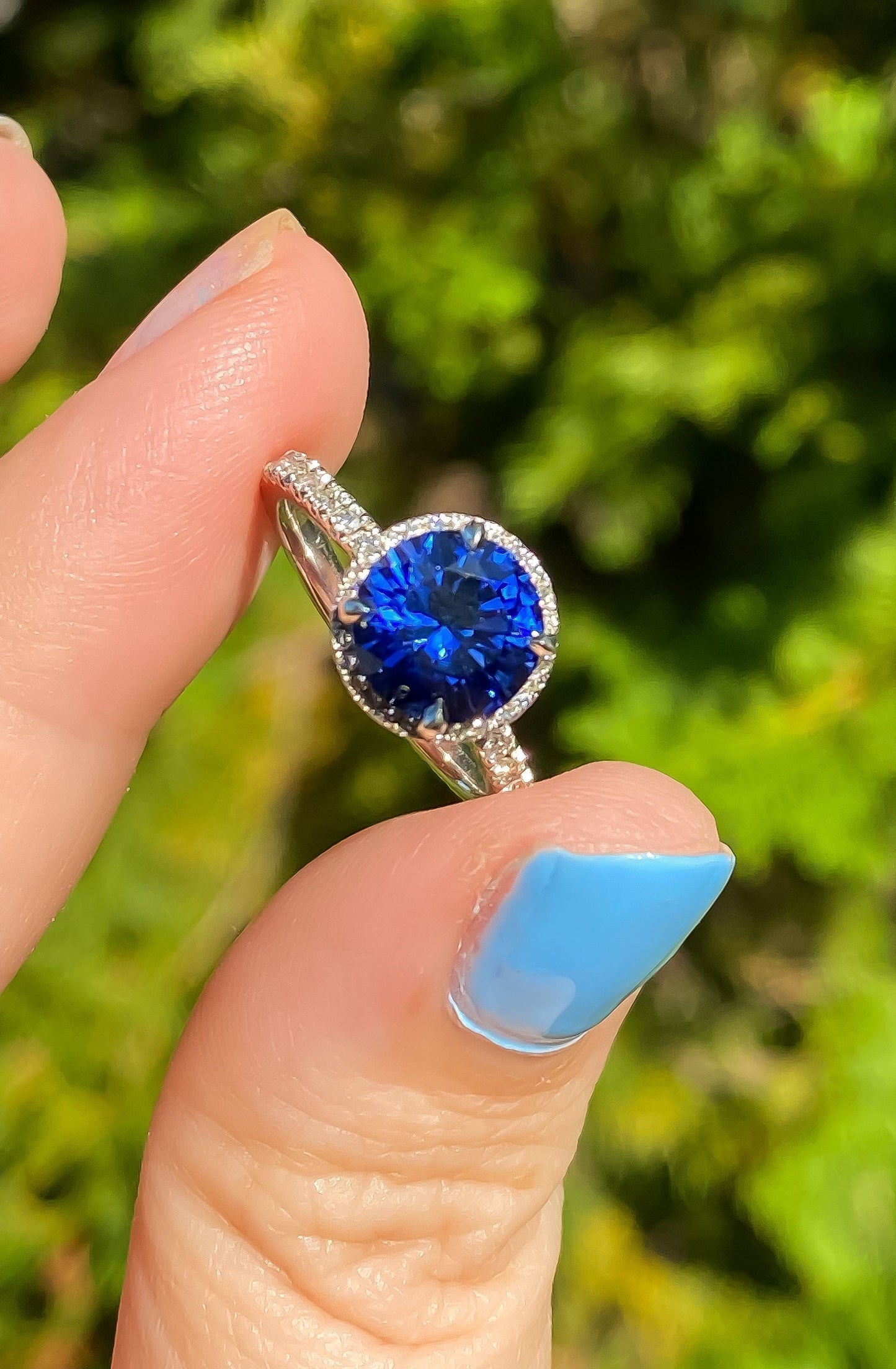 Estate Sapphire Ring with Diamond Halo in Platinum