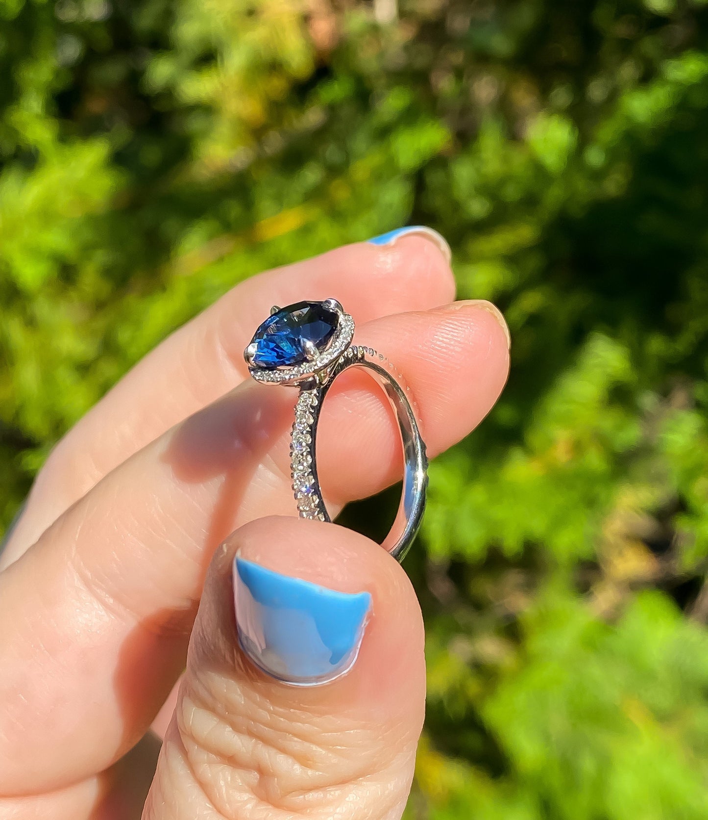 Estate Sapphire Ring with Diamond Halo in Platinum